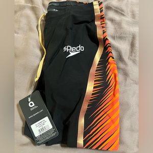 Speedo LZR intent in black and red. Size 22. New inbox and with tags.